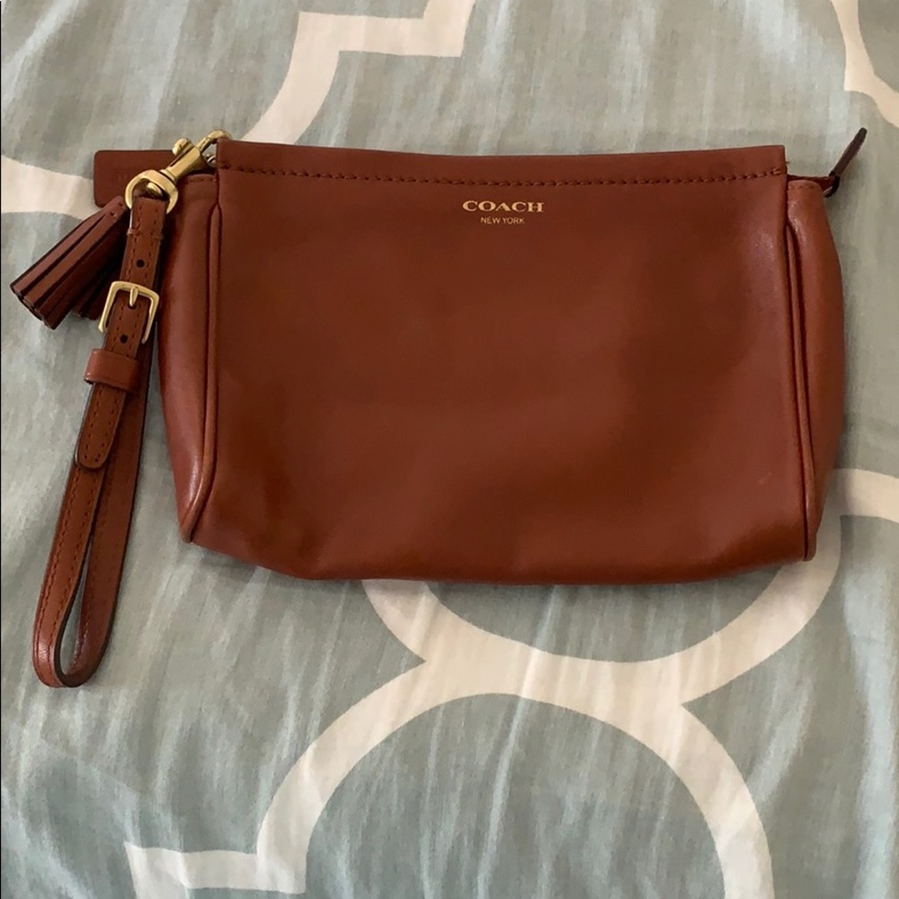 Coach large tassel wristlet cognac